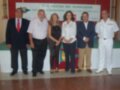 Celebración del XLVII Ascenso del Guadalquivir en Sanlúcar de Barrameda, Sevilla, el 13 de octubre de 2012. Presentación de autoridades y participantes en la ceremonia. Logotipo de la CNI en la imagen.