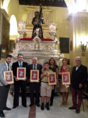 Provincia.El Profesor e Historiador D. Manuel Morales Morales, pronuncio una disertación, sobre el canto de la Sentencia de Pilatos en la Hermandad de Jesús Nazareno de Alcalá del Río.