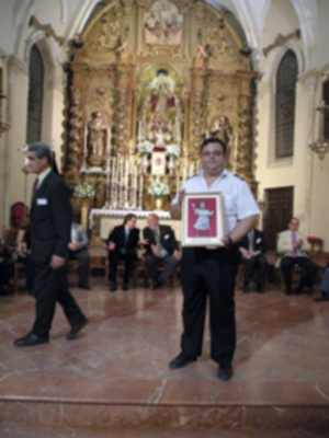 Provincia.El Profesor e Historiador D. Manuel Morales Morales, pronuncio una disertación, sobre el canto de la Sentencia de Pilatos en la Hermandad de Jesús Nazareno de Alcalá del Río.