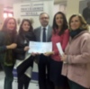 El Colegio de Procuradores de Sevilla entrega el talón del euro solidario a Cáritas Diocesana